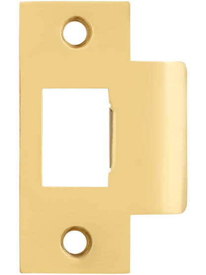 Solid Brass T-Strike Plate - 2 3/4 x 1 1/8 Inch in Un-Lacquered Brass.